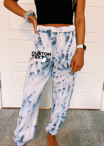 Tailgate Sweatpants in heavy 50% cotton, 50% poly for comfort & durability. Hand tie dyed in spiral design.  Jerzees brand sweatpants. Unisex, tend to run large.  picture shows navy tie dye sweats size SMALL  Add your custom text at checkout